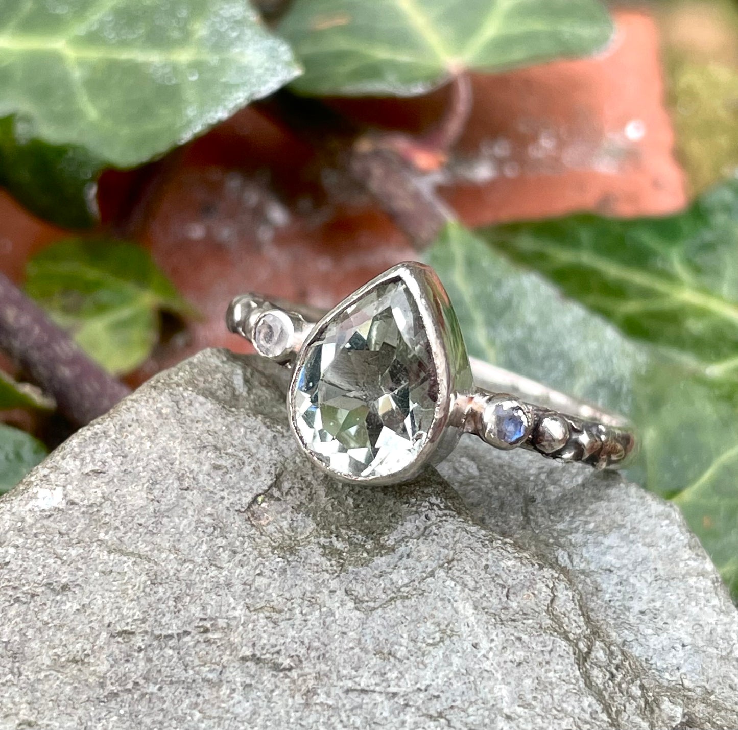 Pear with gemstone shoulders