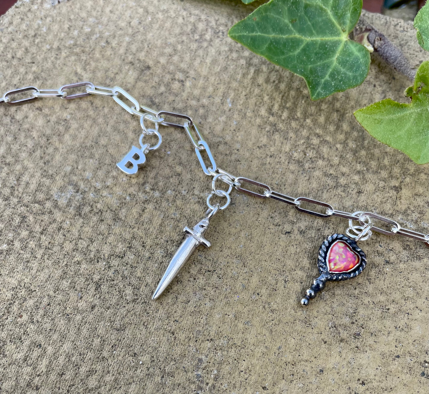 Bleeding heart charm
