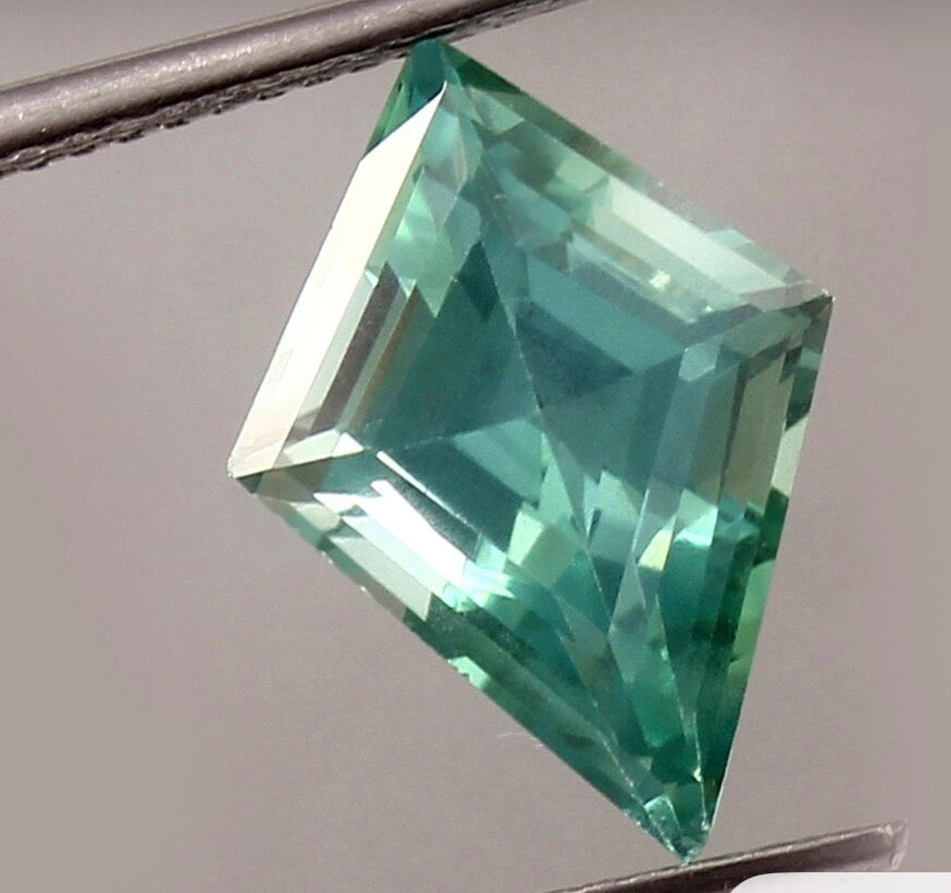 Reserved - green sapphire and guard ring