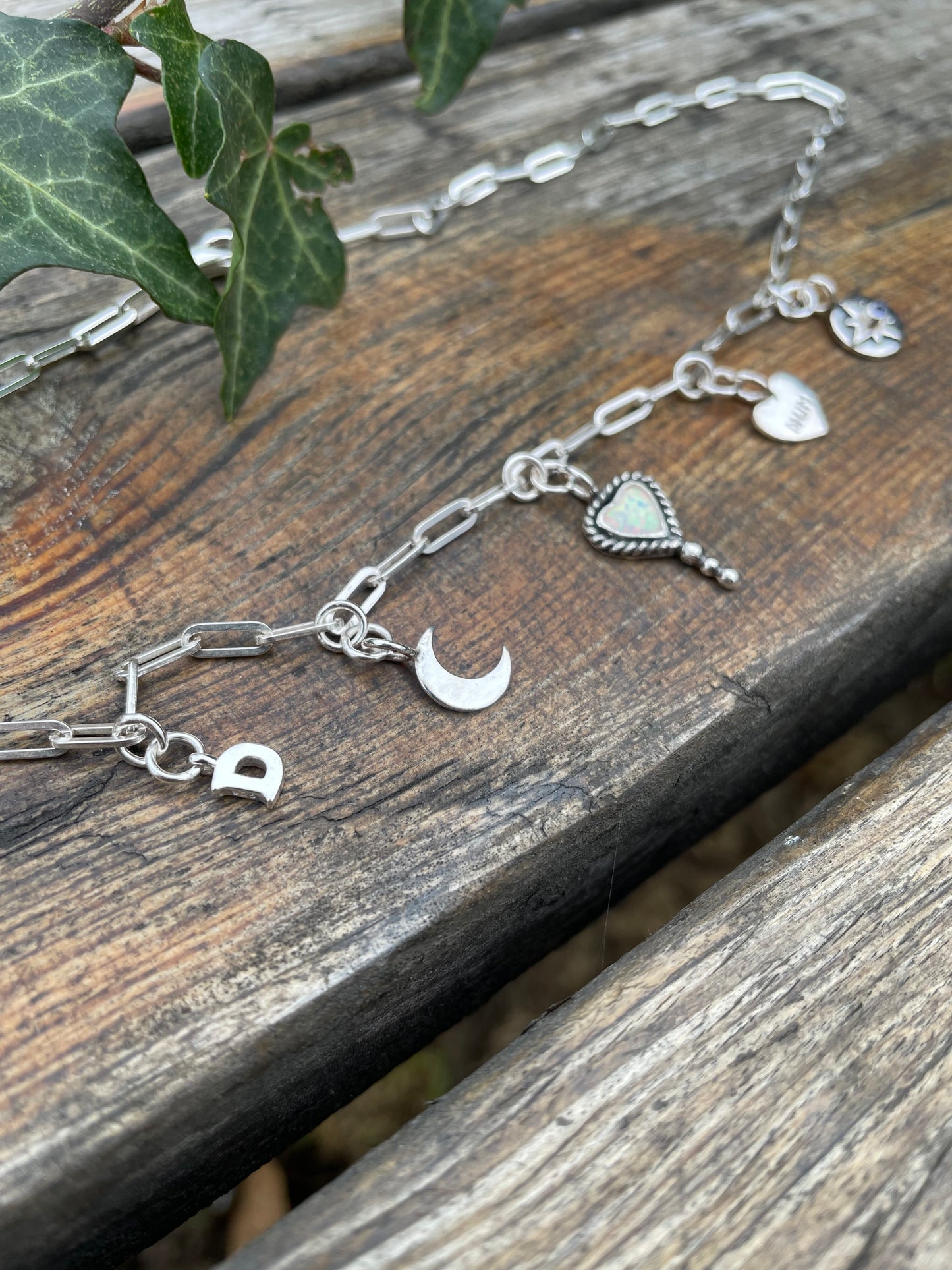 Bleeding heart charm