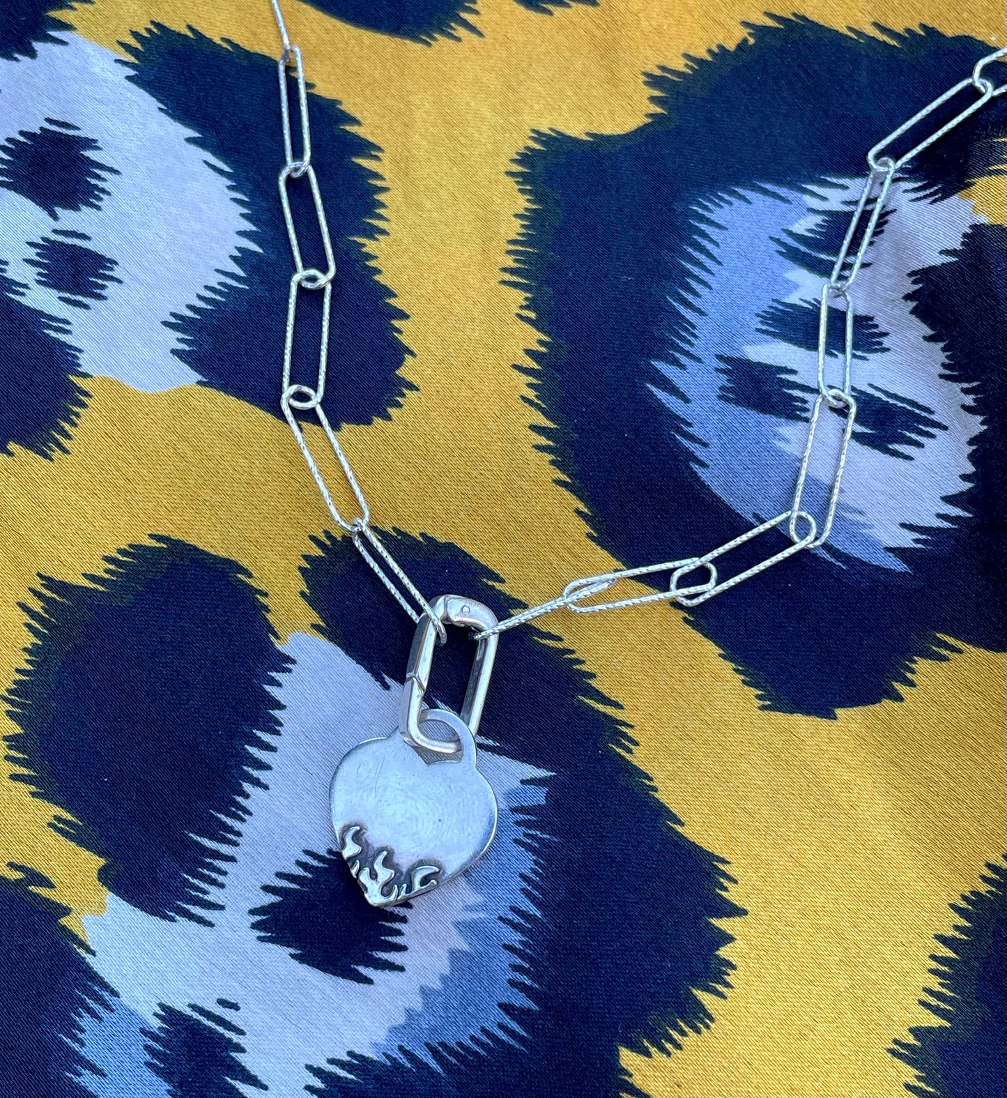 Flaming heart necklace