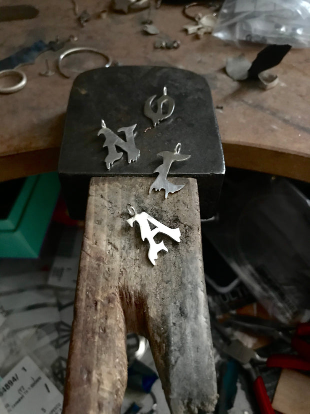 Initial drip pendant